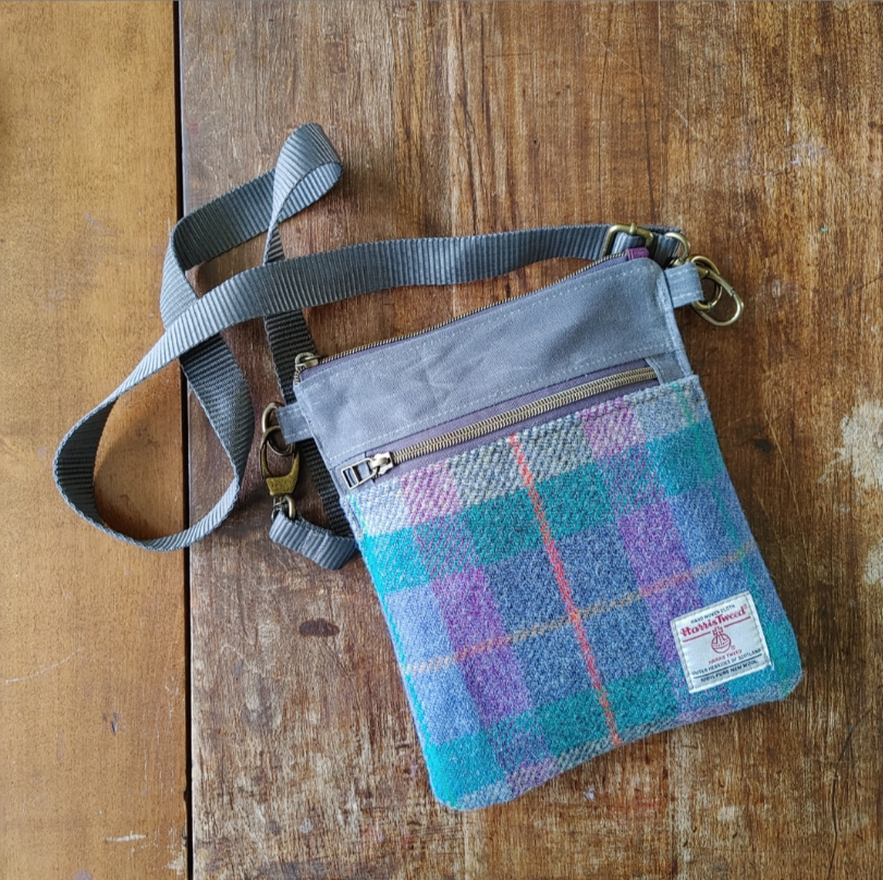 A Sparrow Crossbody in Waxed Canvas and Harris Tweed