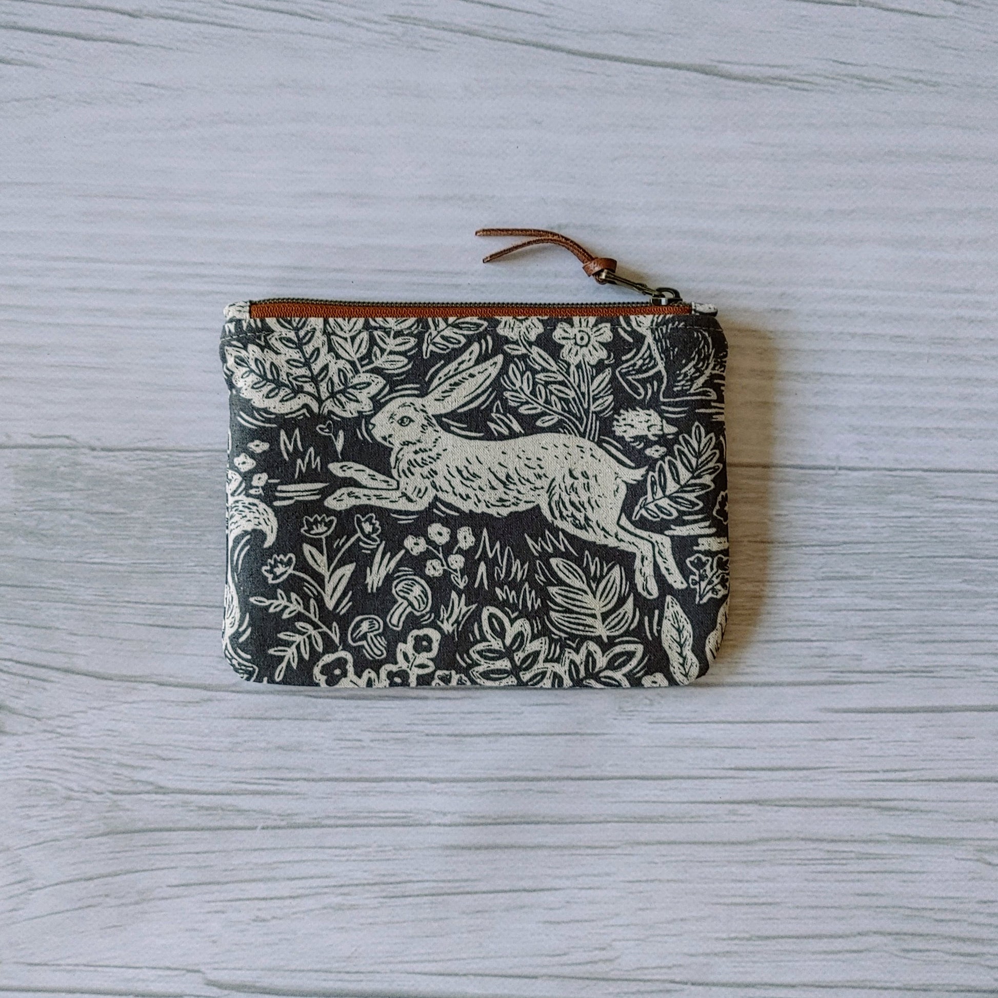 Passport Pouch in Fable Hare by Rifle Paper Co print. From Plumage Studio Accessories