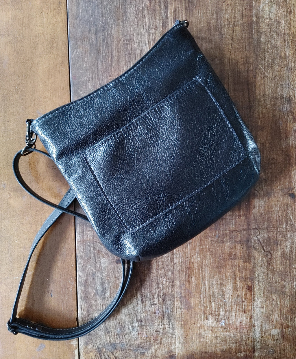 A Highland Swish in Leather with Black Watch Harris Tweed
