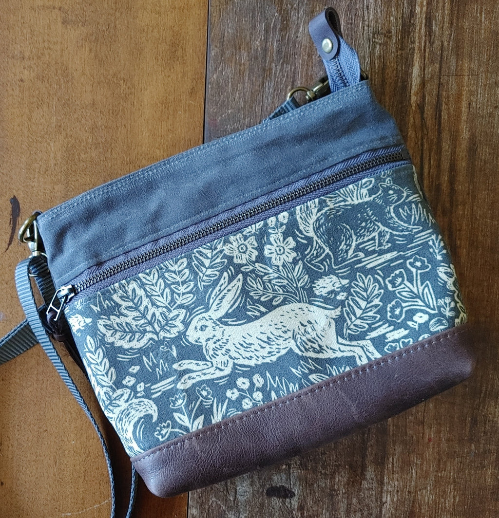 A Crossbody Star Bag in Waxed Canvas and Leather