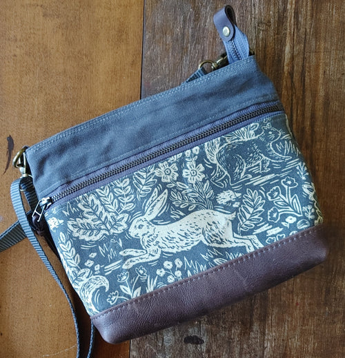 A Crossbody Star Bag in Waxed Canvas and Leather