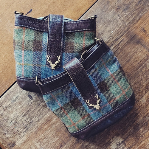 A Highland Swish in Leather with Black Watch Harris Tweed