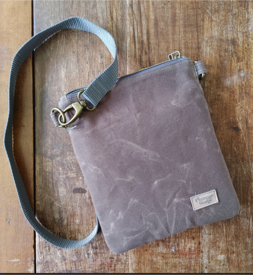 A Sparrow Crossbody in Waxed Canvas and Harris Tweed