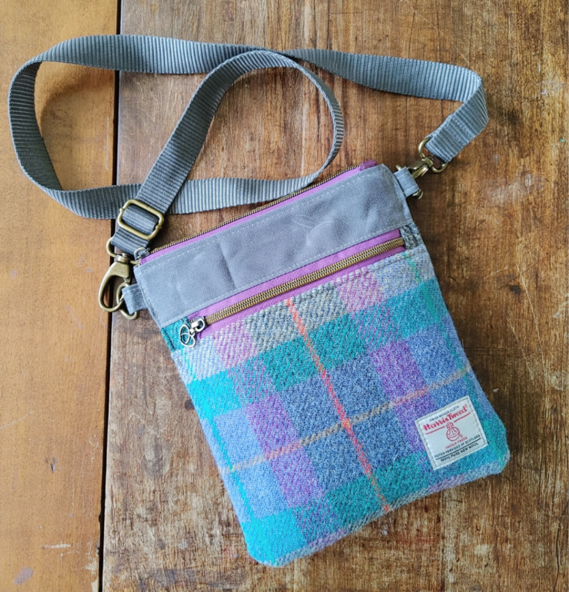 A Sparrow Crossbody in Waxed Canvas and Harris Tweed