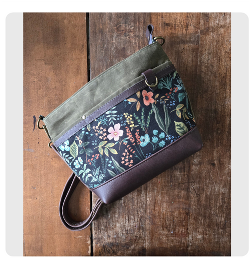 A Starling Handbag in Leather and Waxed Canvas with Floral