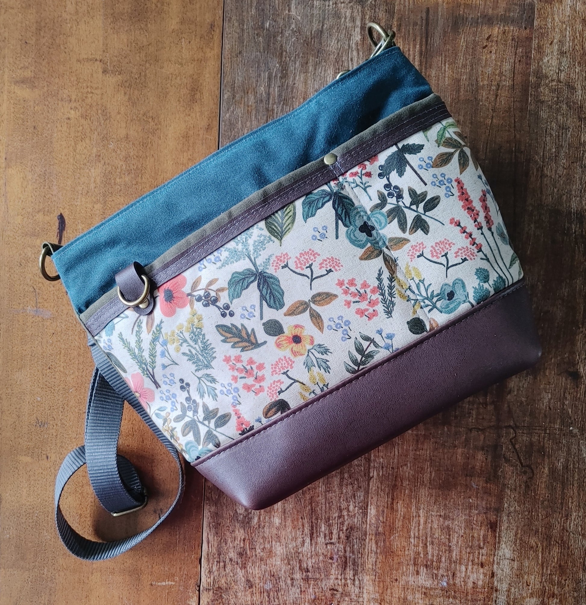 A Starling Handbag in Leather with Olive and Teal Waxed Canvas with Floral