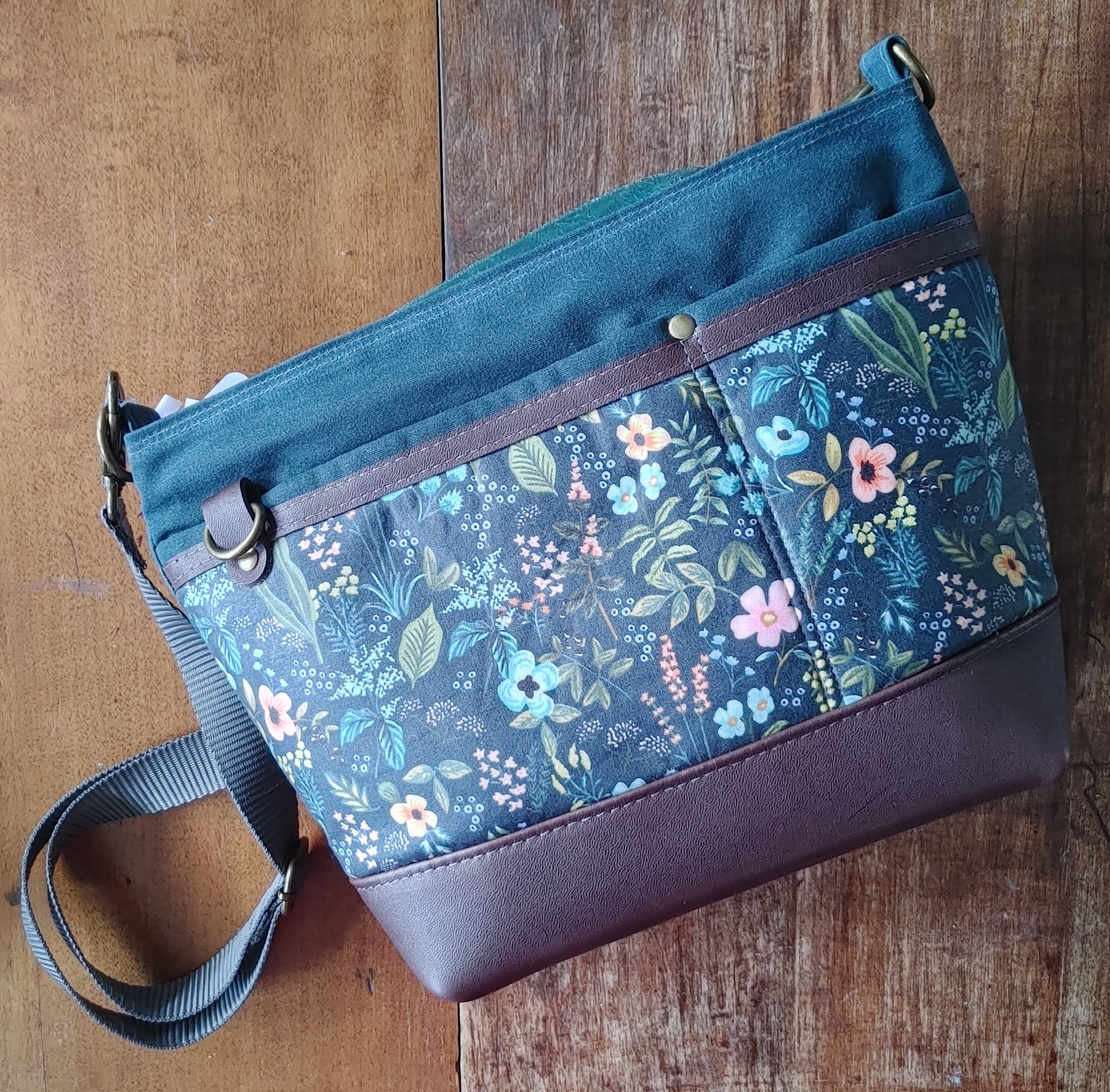 A Starling Handbag in Leather and Teal Waxed Canvas with Floral