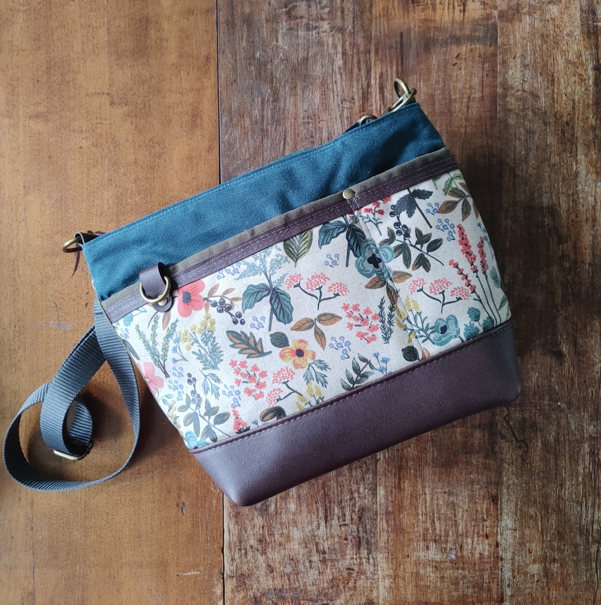 A Starling Handbag in Leather with Olive and Teal Waxed Canvas with Floral