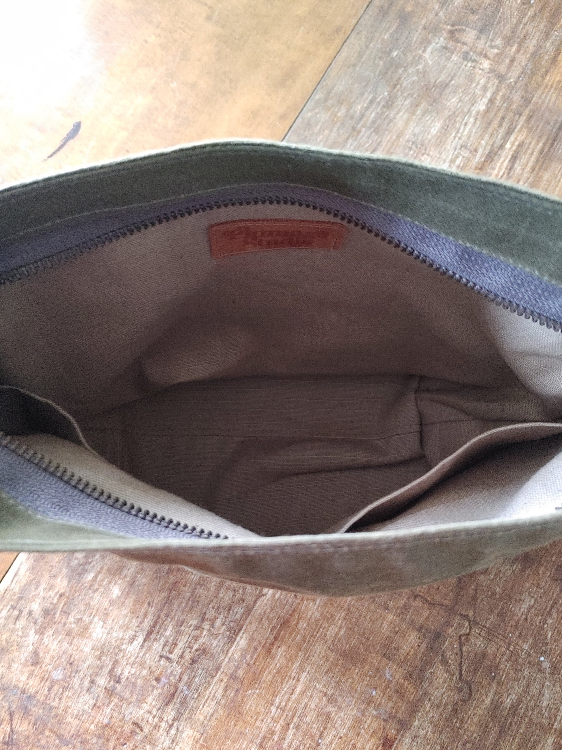 A Starling Handbag in Leather and Waxed Canvas