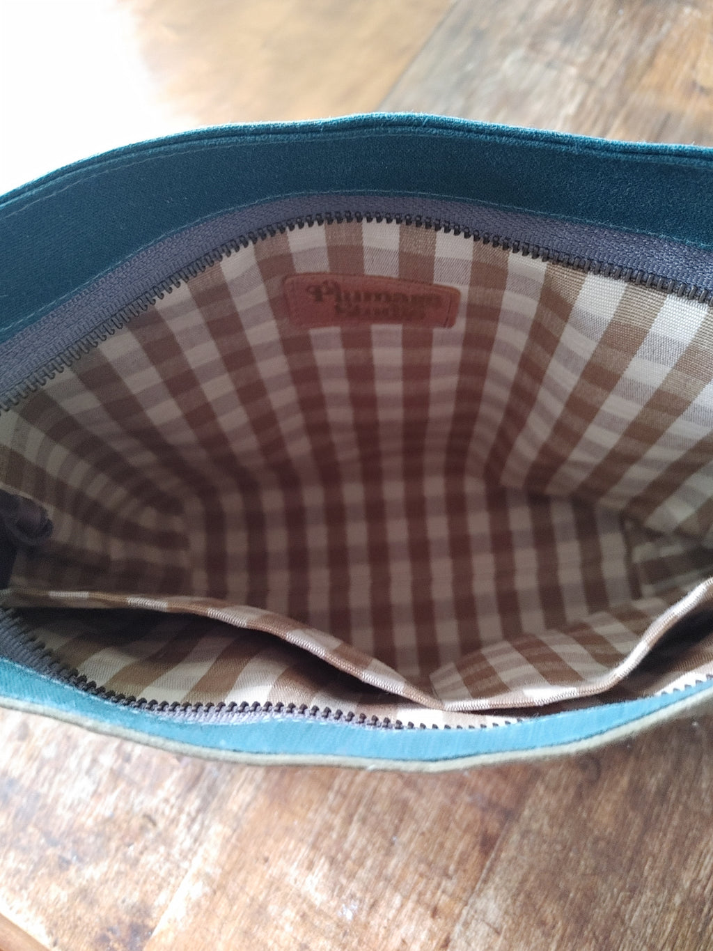 A Starling Handbag in Leather and Teal Waxed Canvas with Floral