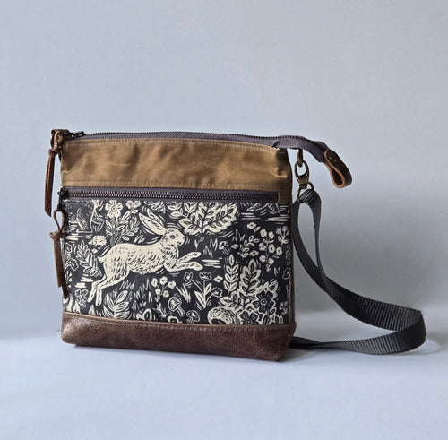 A Crossbody Star Bag in Waxed Canvas and Leather