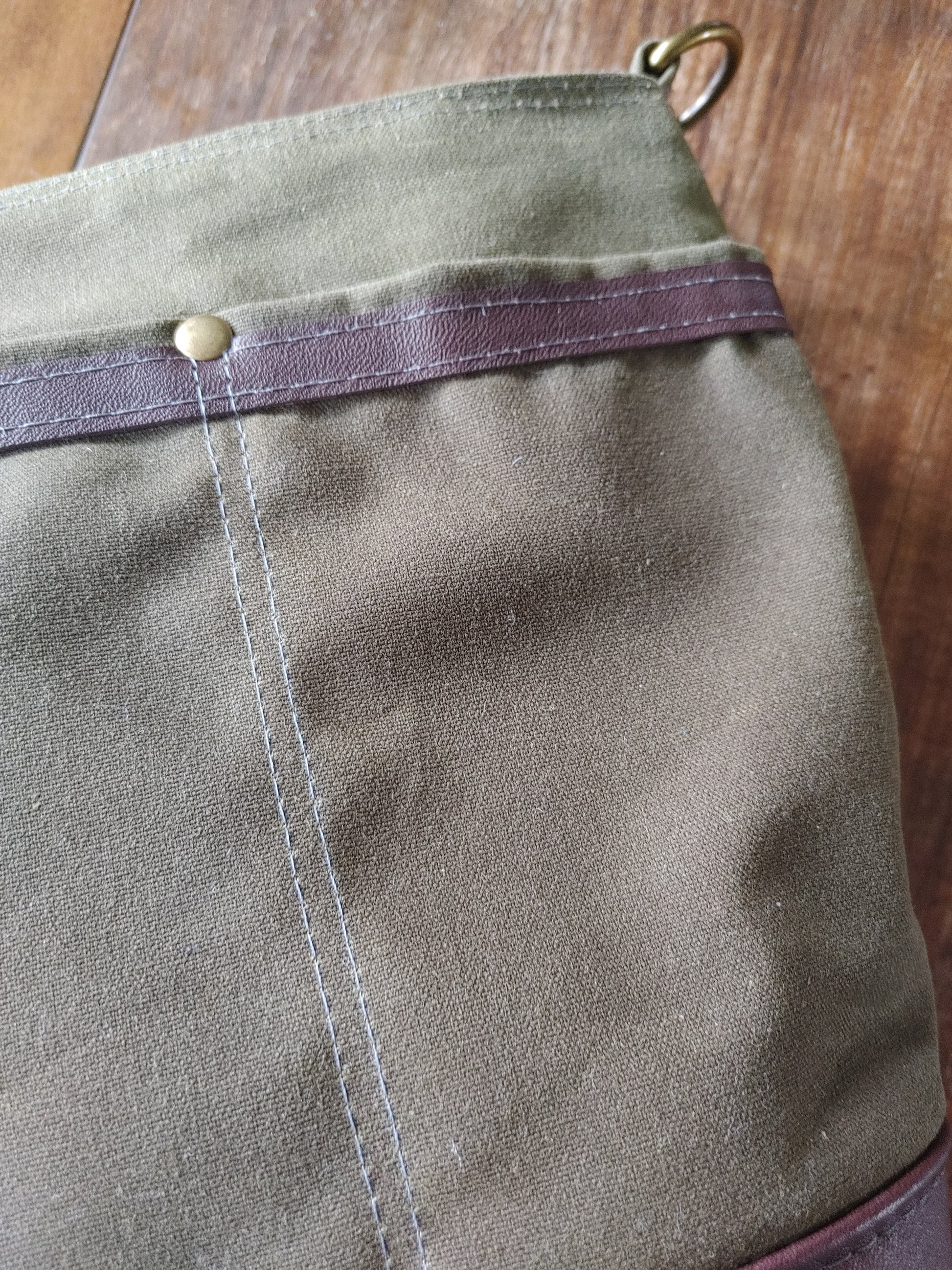 A Starling Handbag in Leather and Waxed Canvas