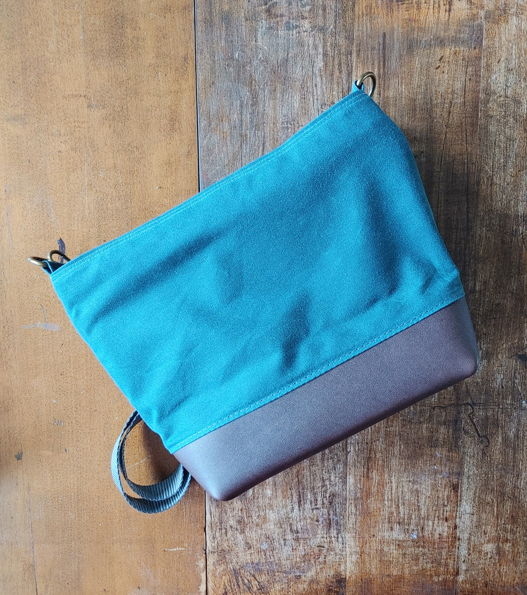 A Starling Handbag in Leather and Teal Waxed Canvas with Floral