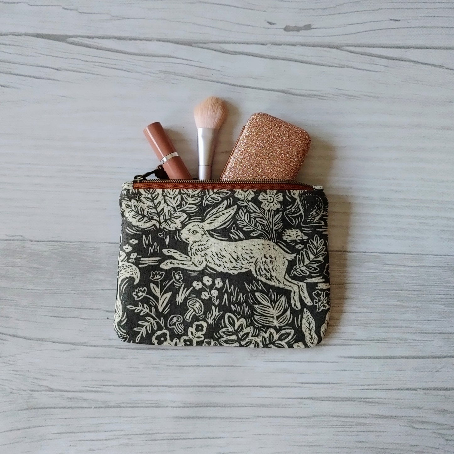 Passport Pouch in Fable Hare by Rifle Paper Co print. From Plumage Studio Accessories