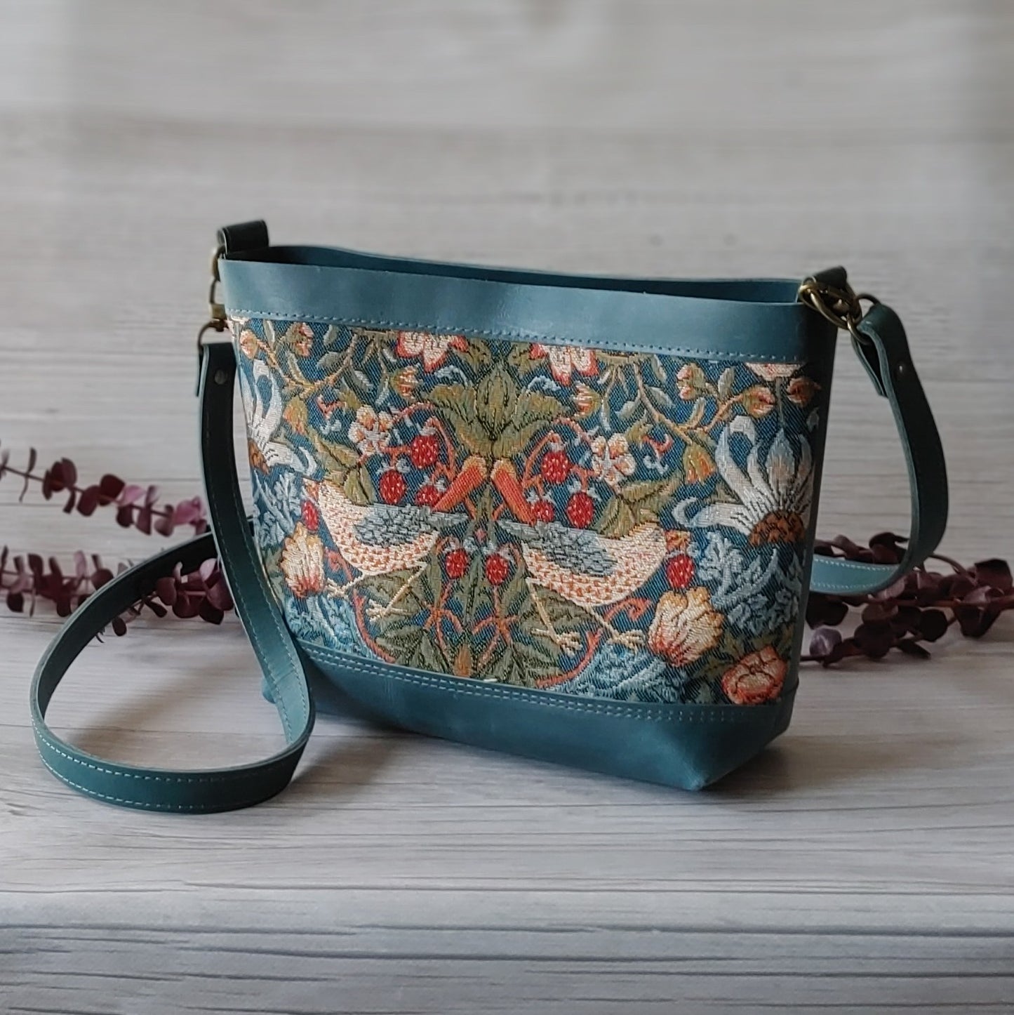 Handbag in leather with panel of Strawberry Thief by William Morris tapestry. Made in Canada by Plumage Studio Accessories