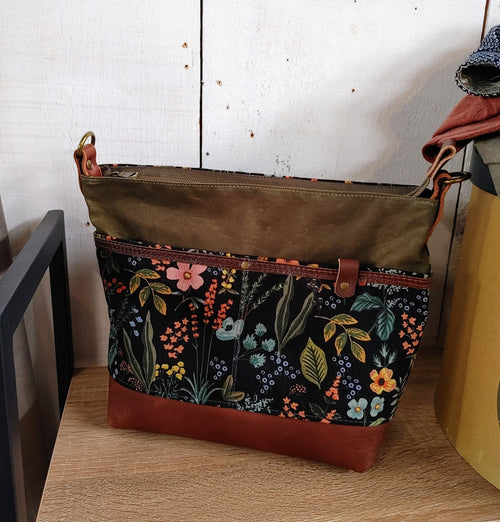 A Starling Handbag in Leather and Waxed Canvas with Floral