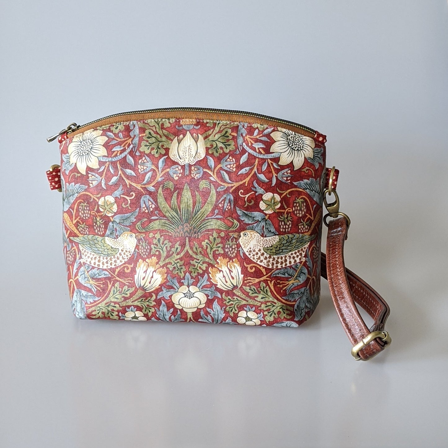 Handbag in red Strawberry Thief by William Morris print. Made in Canada by Plumage Studio Accessories