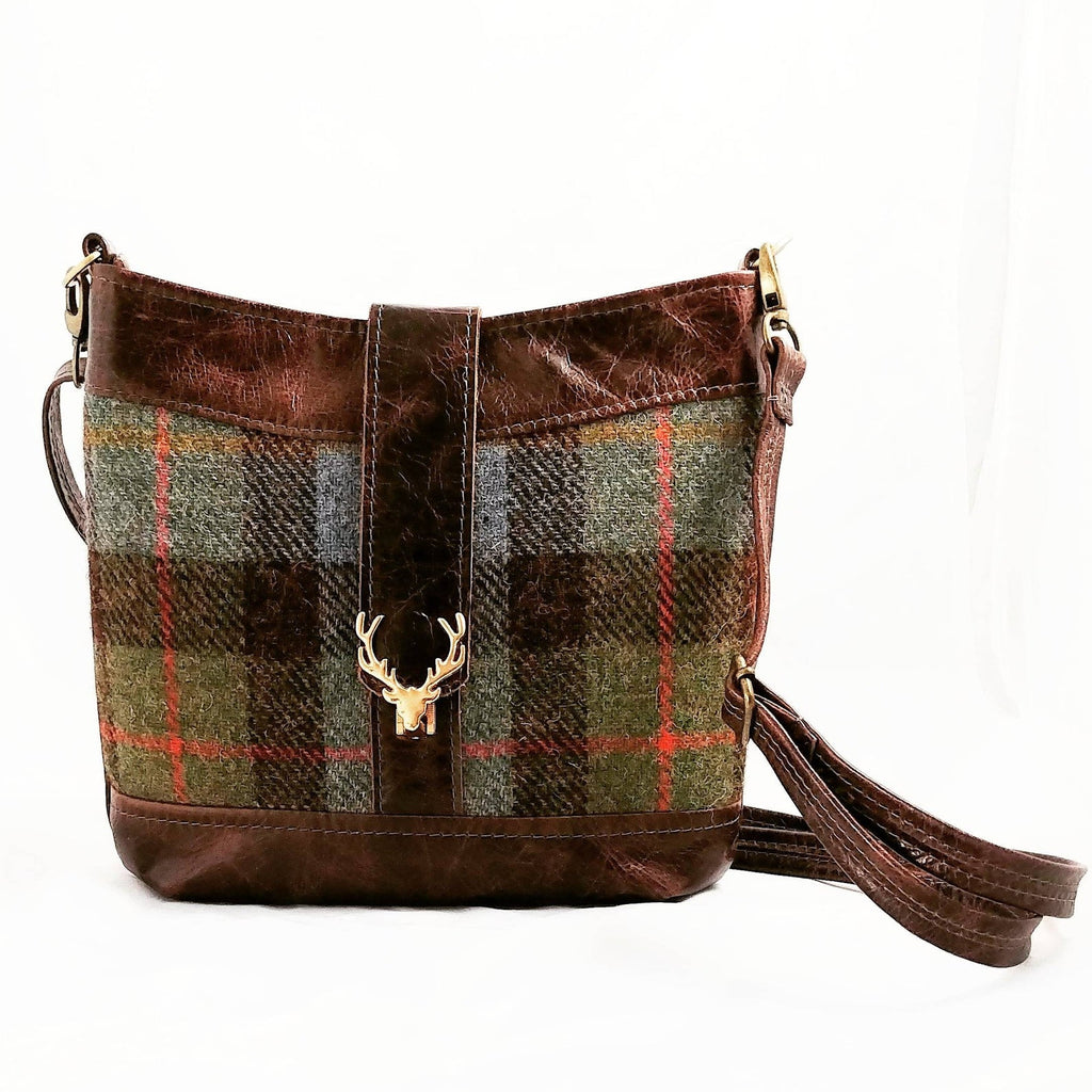 A Highland Swish in Leather with Black Watch Harris Tweed